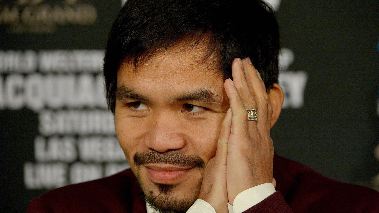 Manny Pacquiao's baby is torn between the Spurs and Warriors