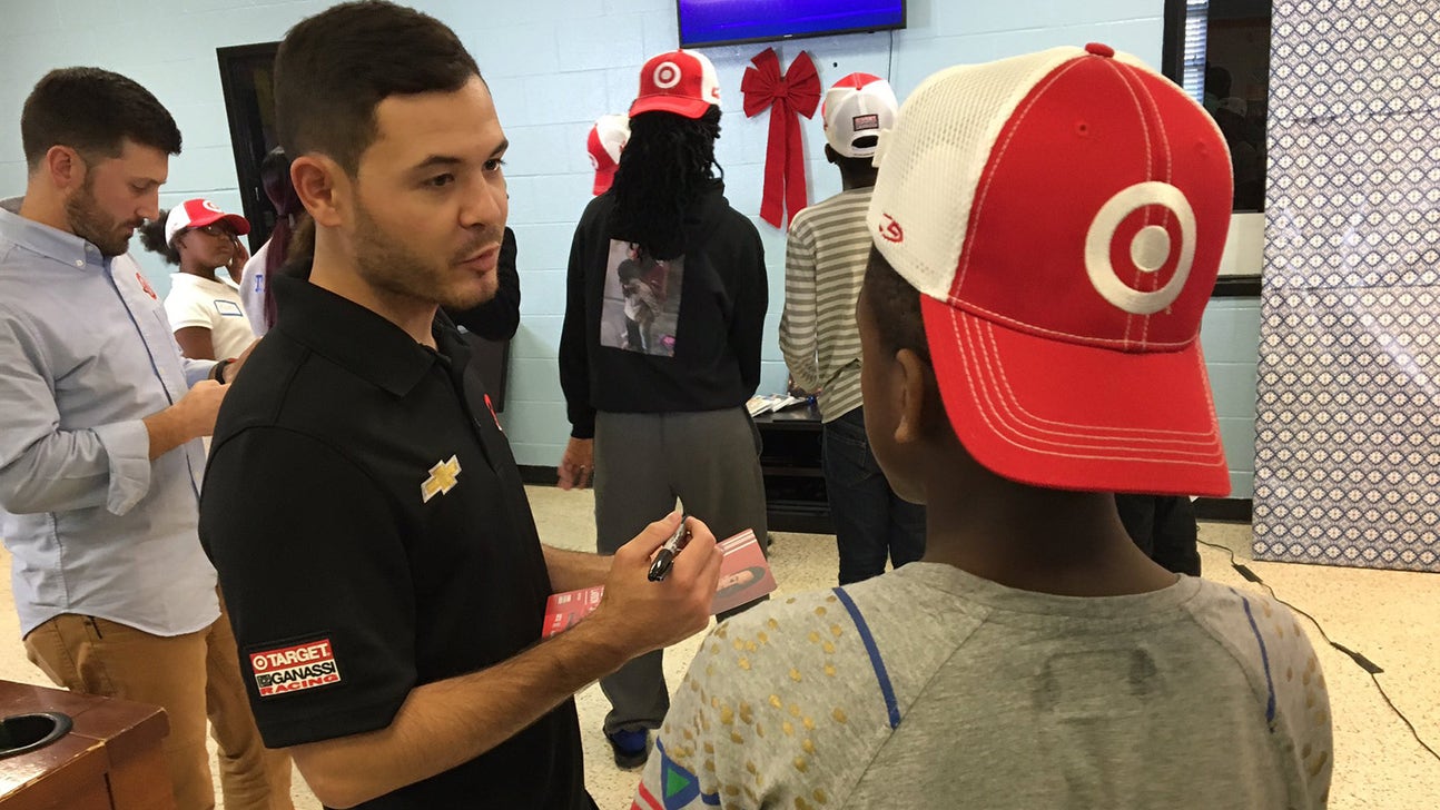 Kyle Larson reflects on fatherhood at Boys and Girls Club holiday donation event