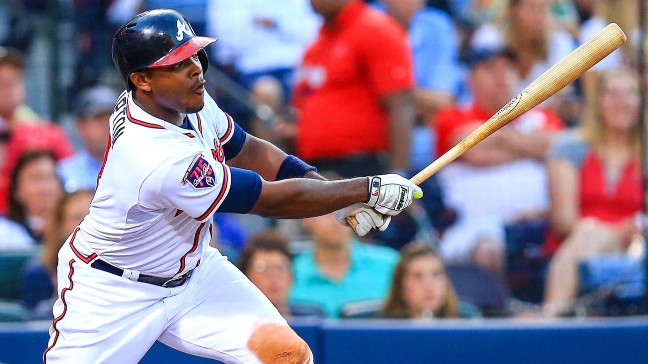 Braves hold out Justin Upton with bruised back