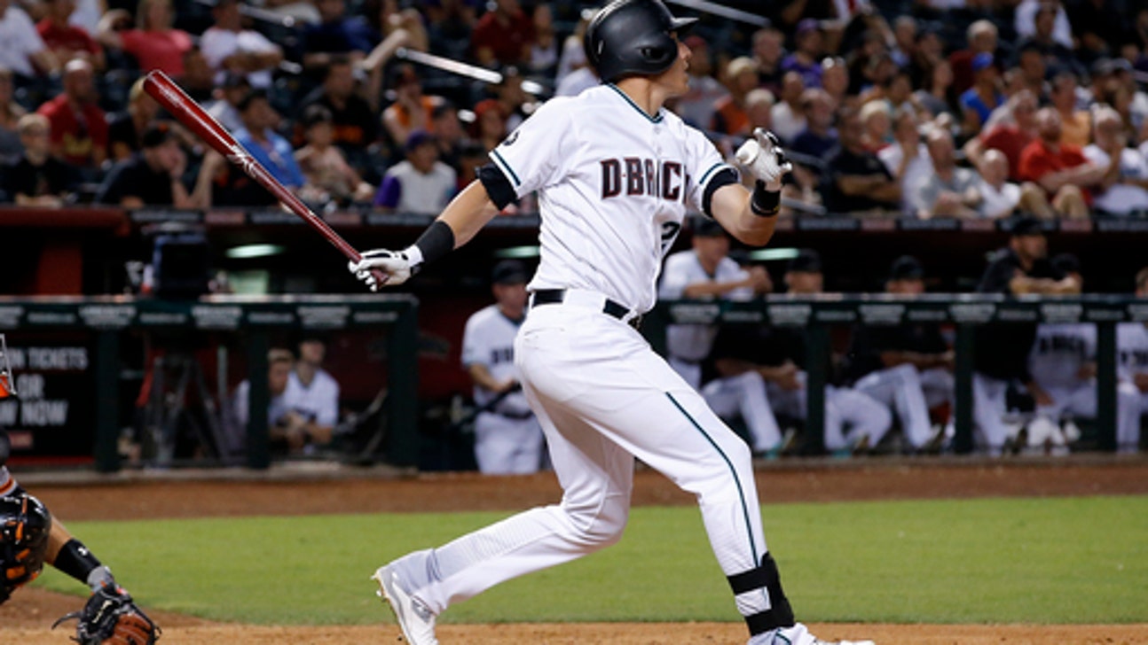 Tomlinson, Giants outlast Diamondbacks 7-6 in 12 innings