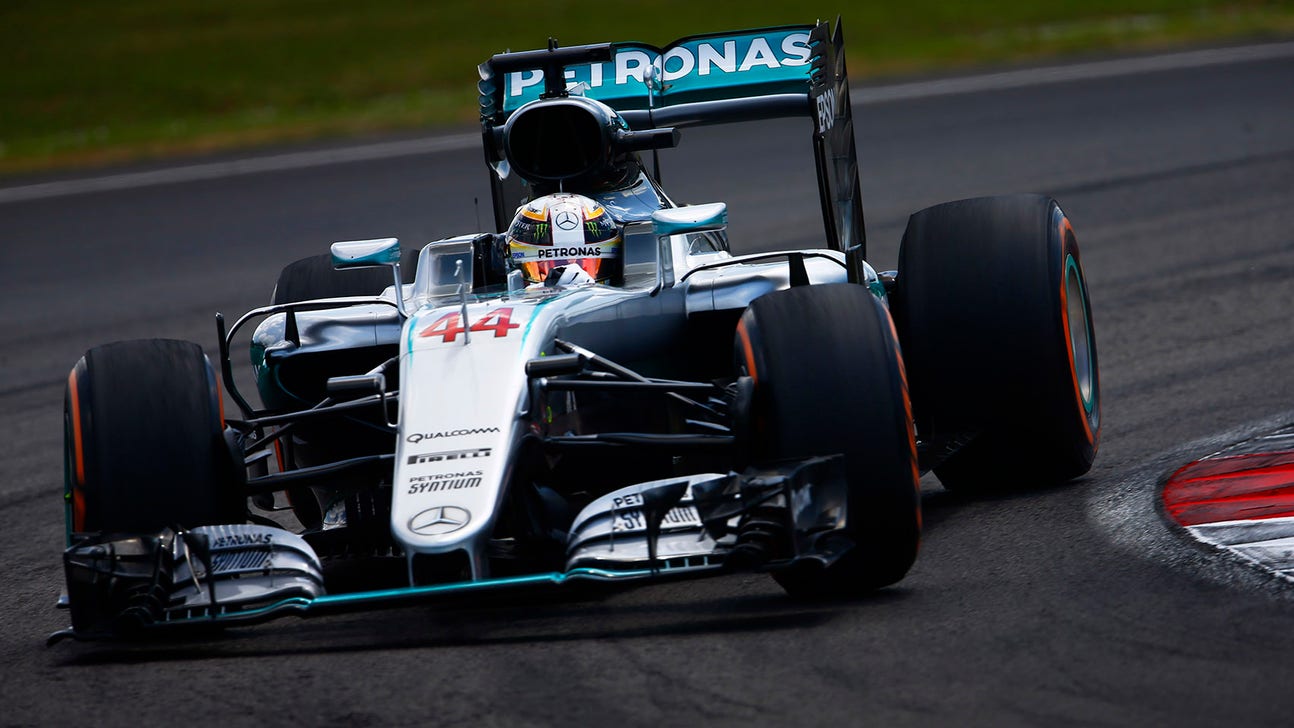 Lewis Hamilton takes pole for Malaysia Grand Prix