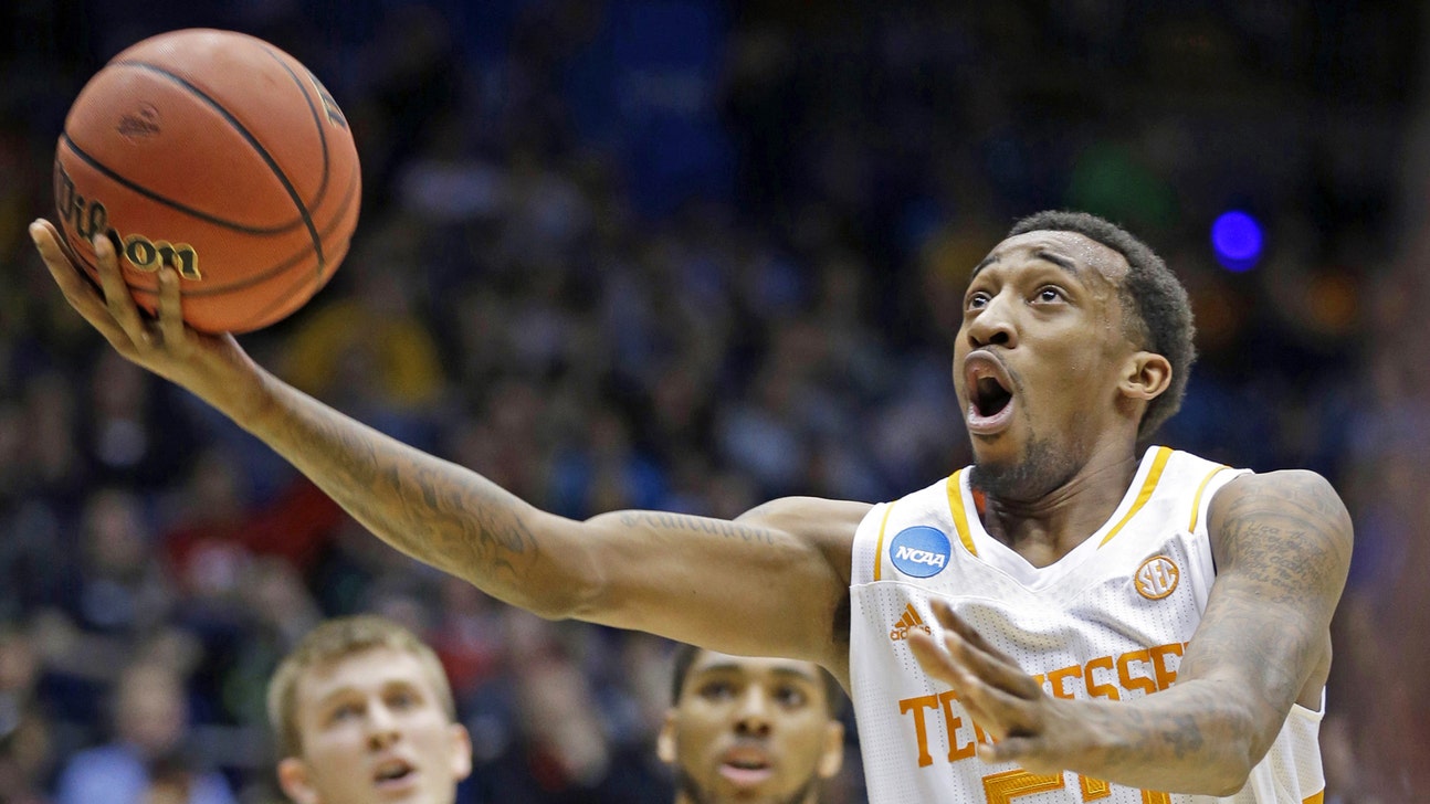 Vols rally to beat Iowa 78-65 in OT at First Four