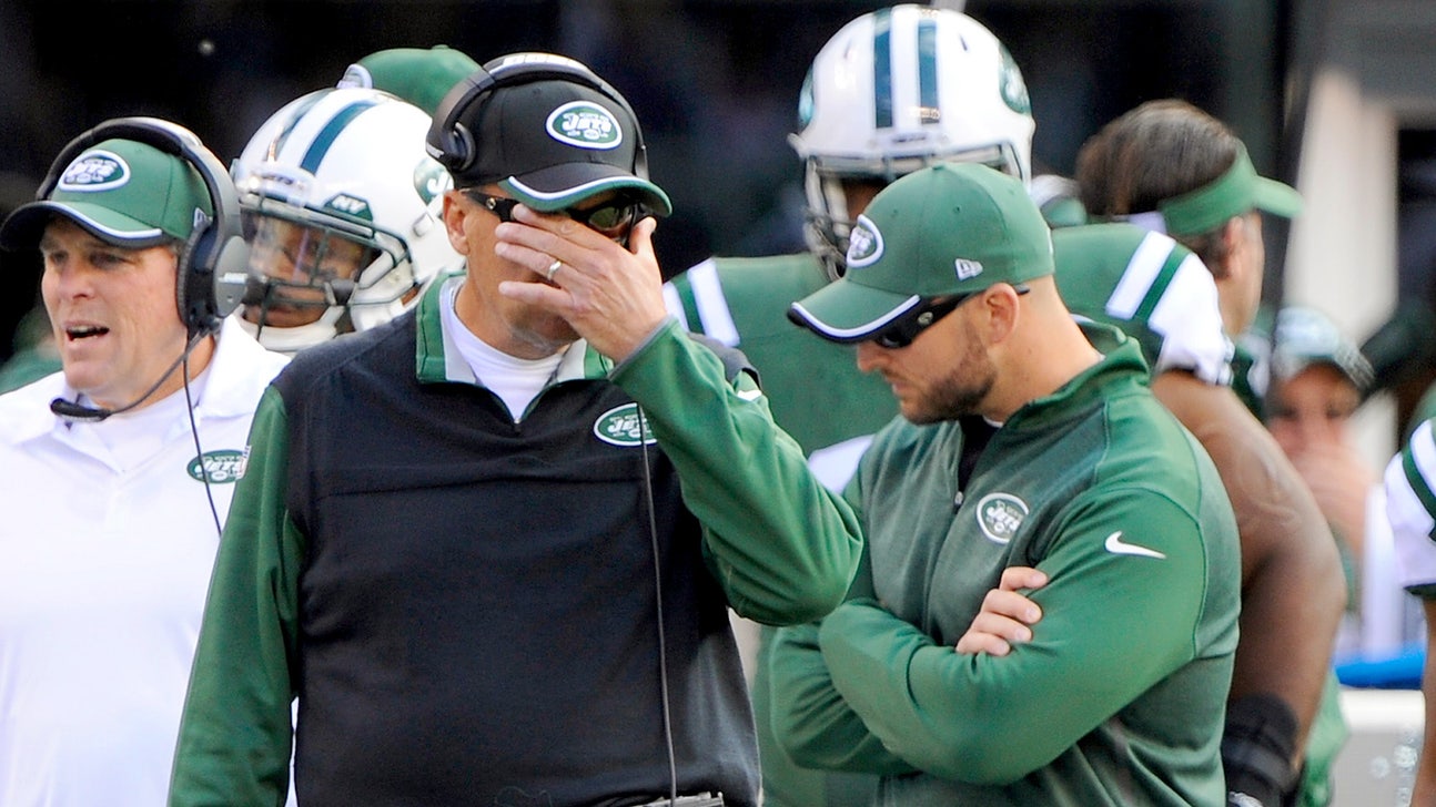 Is Rex reacting here to his team's play or Jets fans' shirts?
