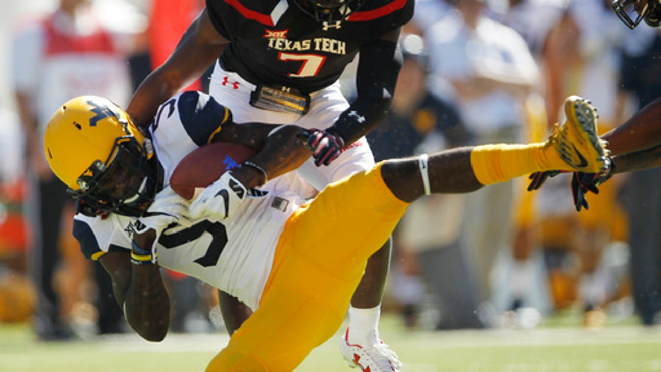 West Virginia's crazy grabs get Oklahoma State's attention