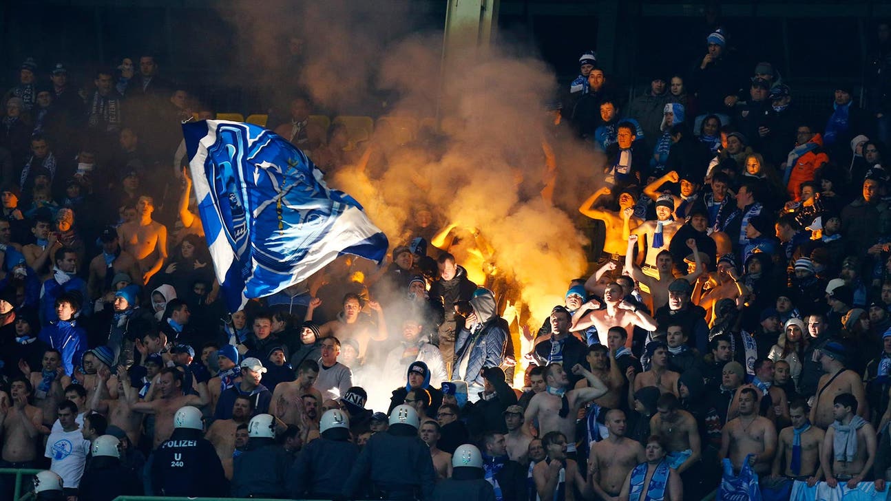 UEFA charges Zenit for fans burning German banner during Dortmund match