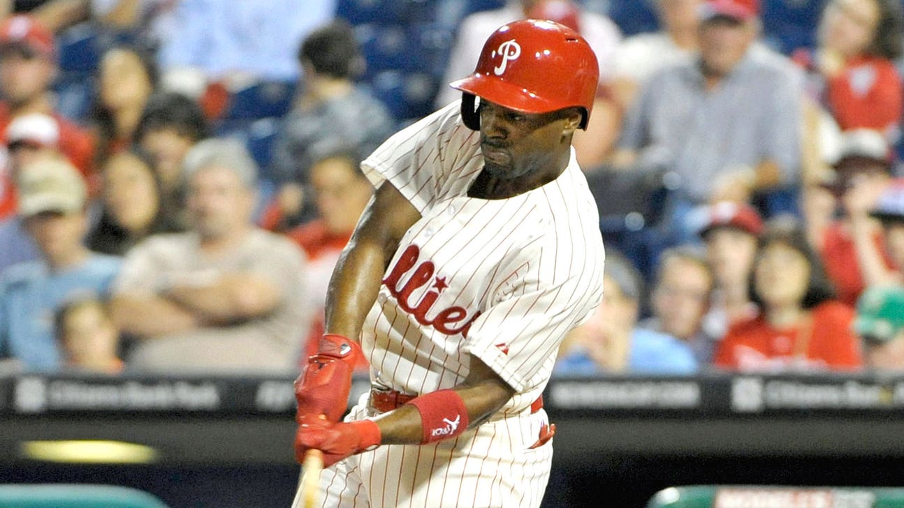 Rollins ties Schmidt as Phillies' all-time hits leader in loss to Cubs