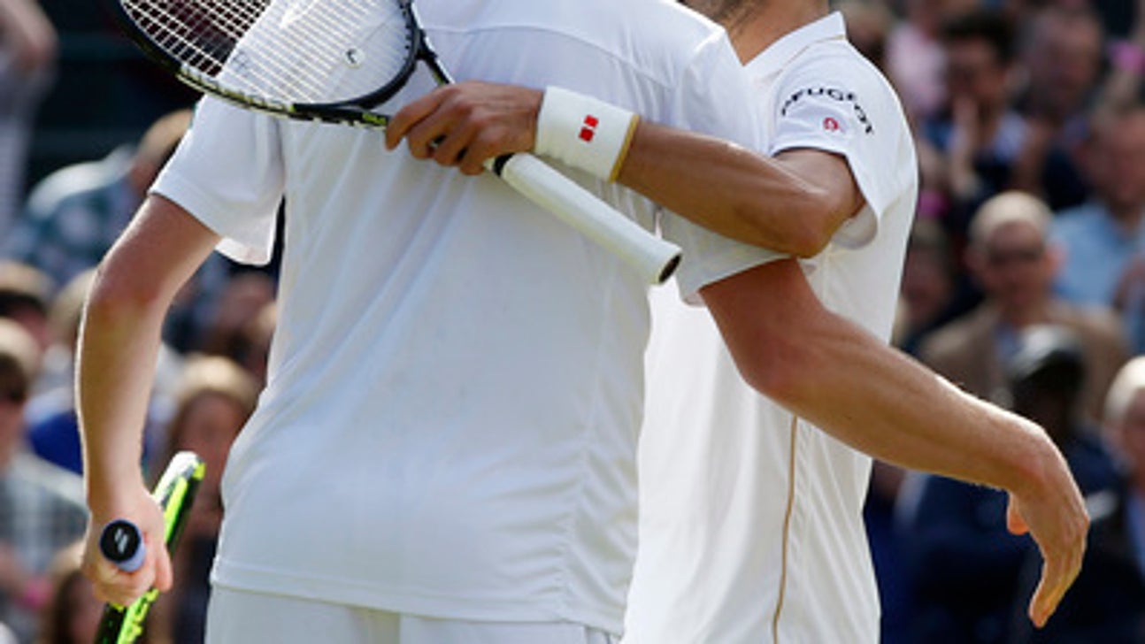 The Latest: Isner at it again, now 12-all in 5th vs. Tsonga