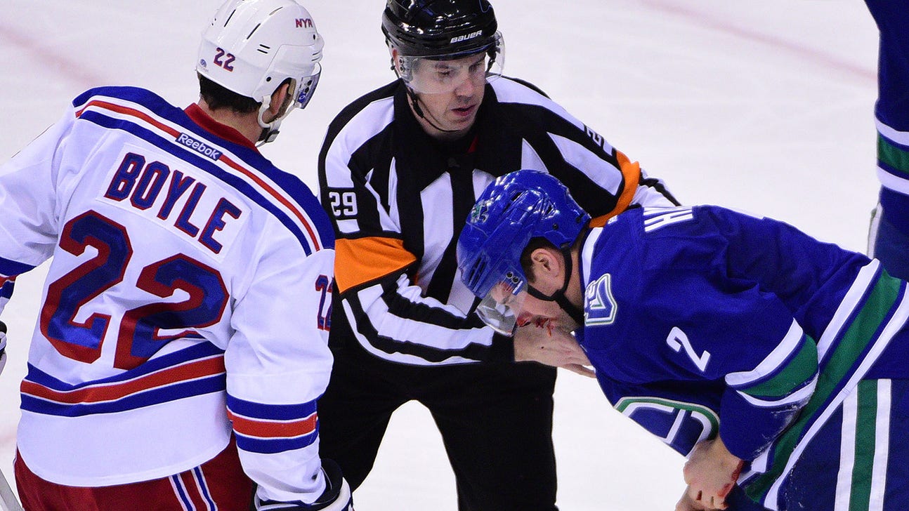 Canucks top Rangers but lose bloodied Hamhuis to puck to face