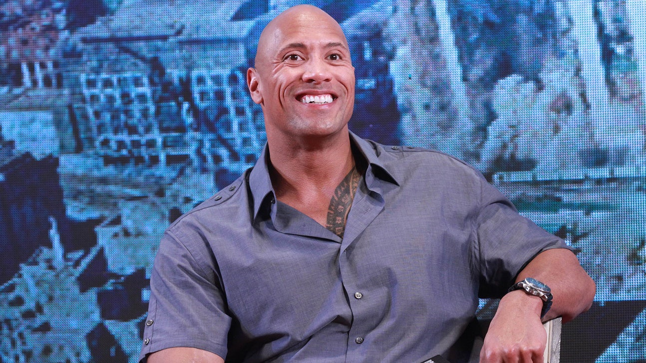 PHOTO: Miami honors alum The Rock with special Hurricanes jersey