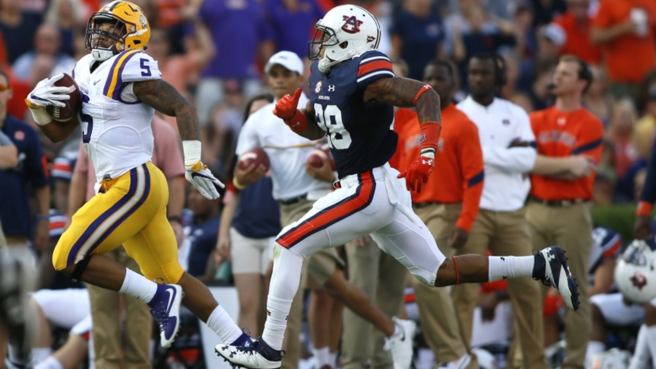 Auburn photographer gets drilled in face by football (Video)