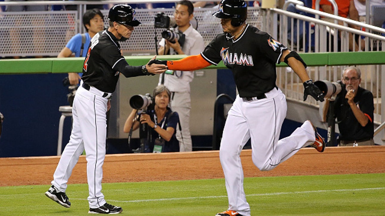 Fan makes incredible catch on Giancarlo Stanton homer