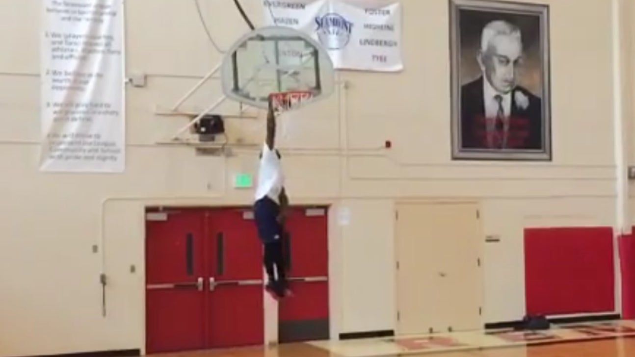 Nate Robinson is out here dunking tennis balls on a 12-foot hoop