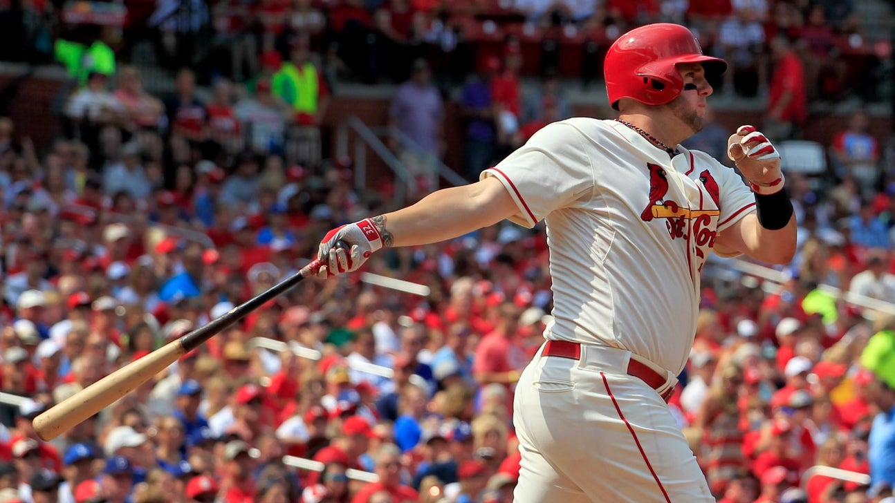 Cards score four in first, beat Dodgers and Greinke 4-2