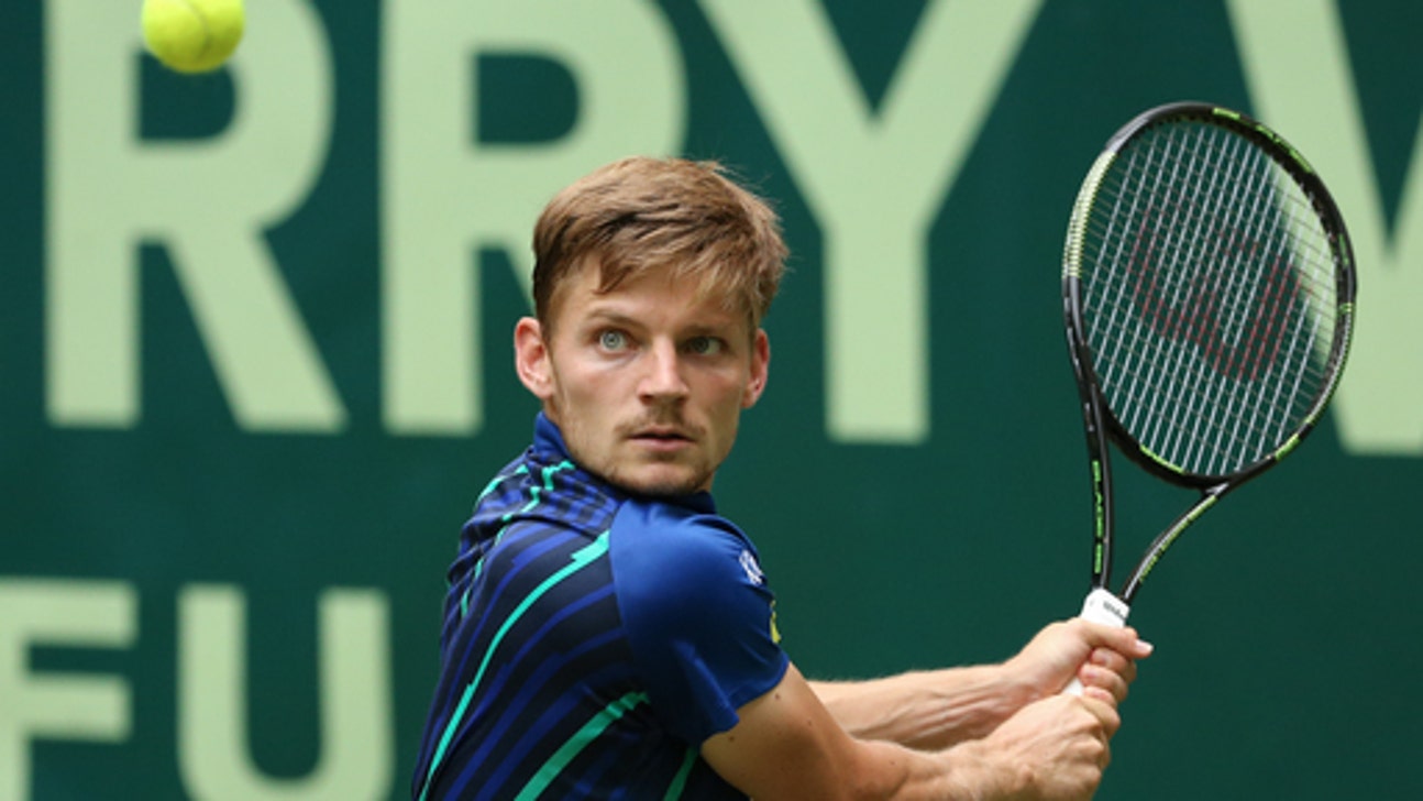 Federer tops Jaziri after trouble in second set