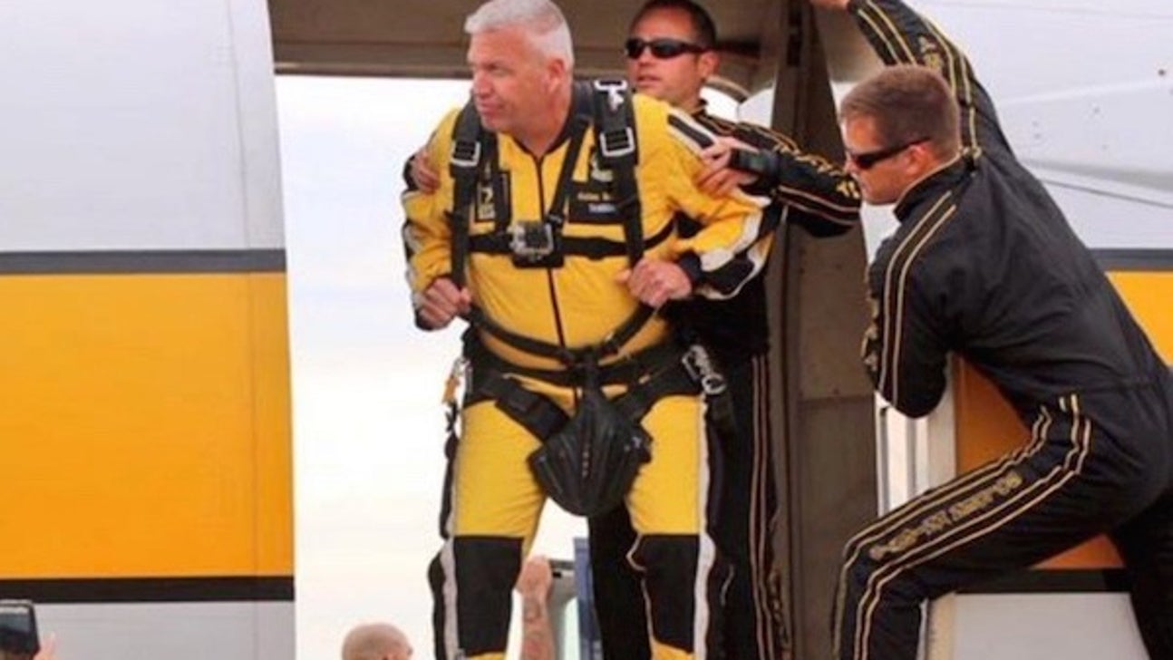 Rex Ryan jumps out of an airplane