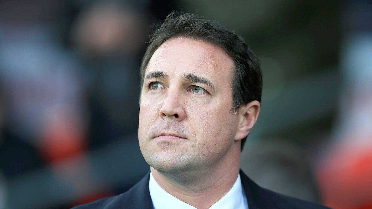 Mackay apologizes for "unacceptable, inappropriate" text messages