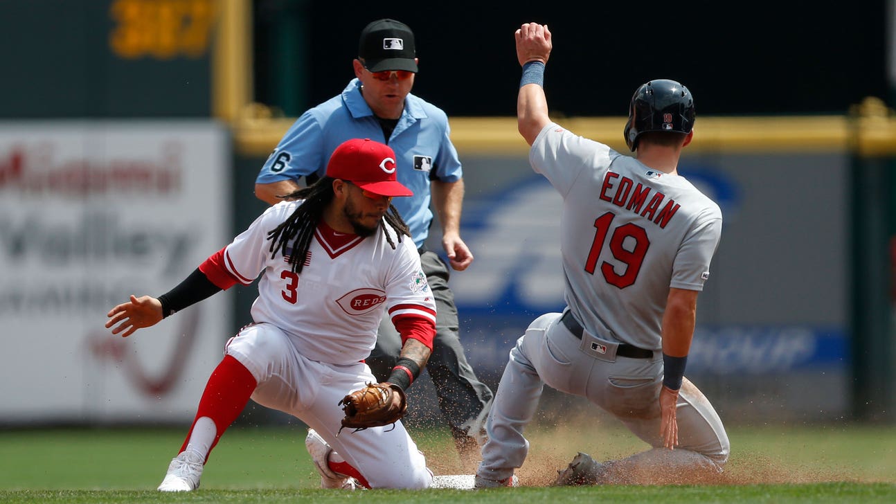 Cardinals hold off Reds 5-4, splitting four-game series