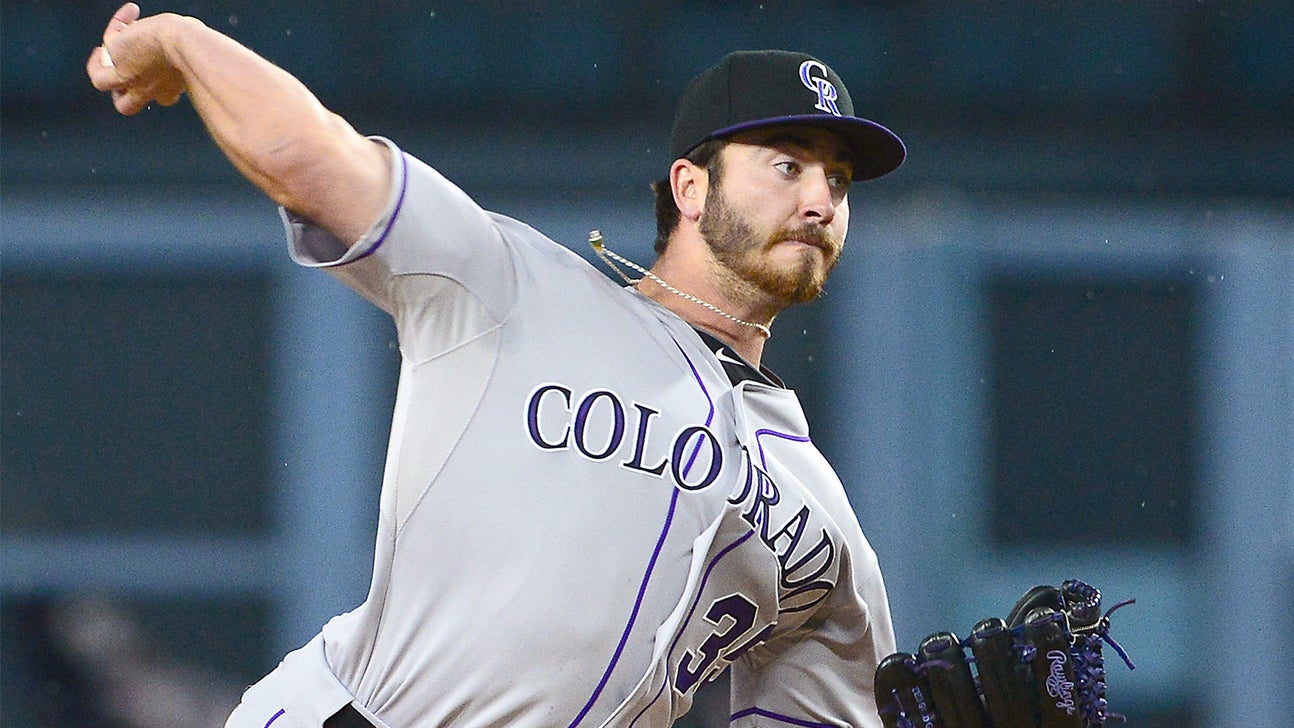 Phillies' Asche breaks up Rockies no-hitter by beating shift