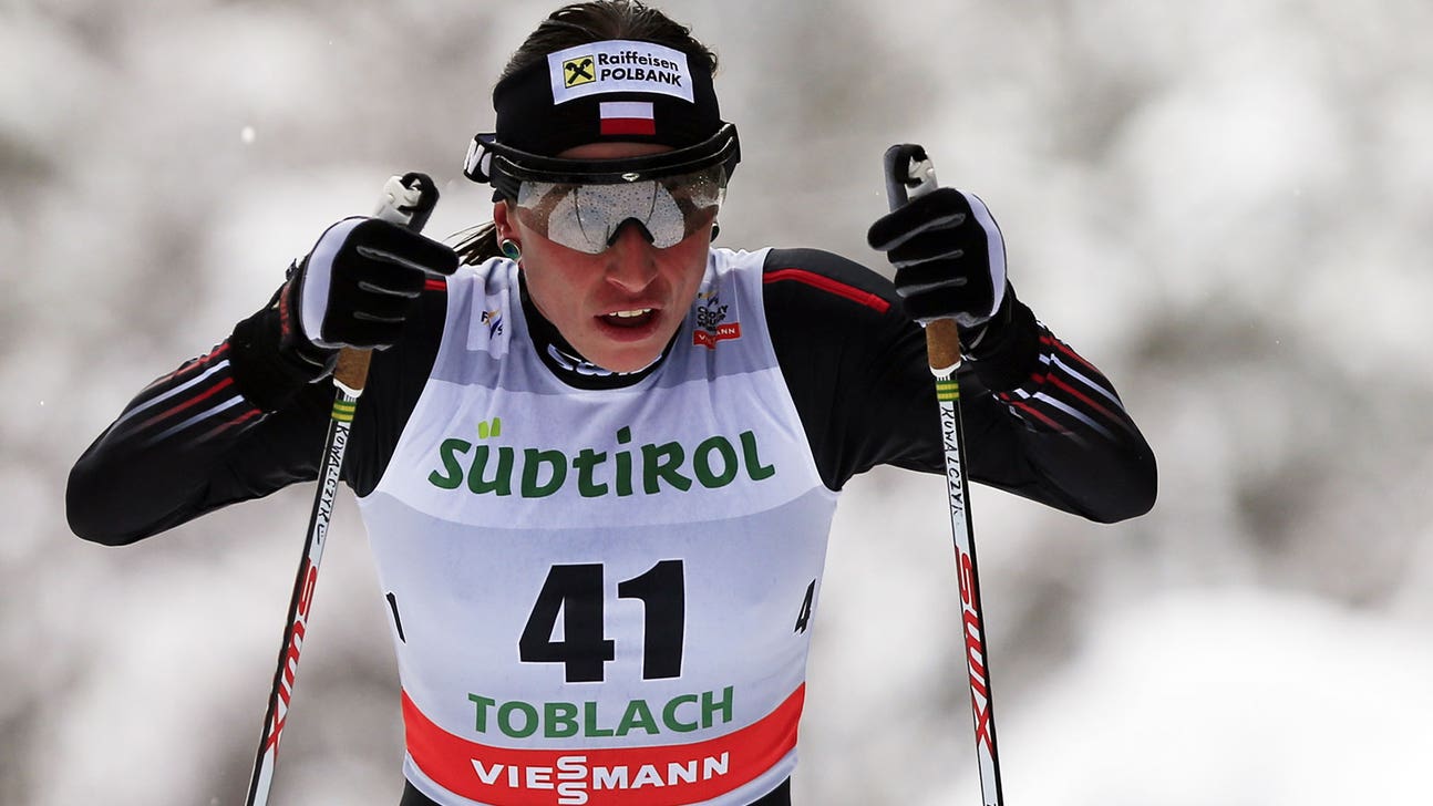 Poland's Kowalczyk has foot fracture, will continue to compete