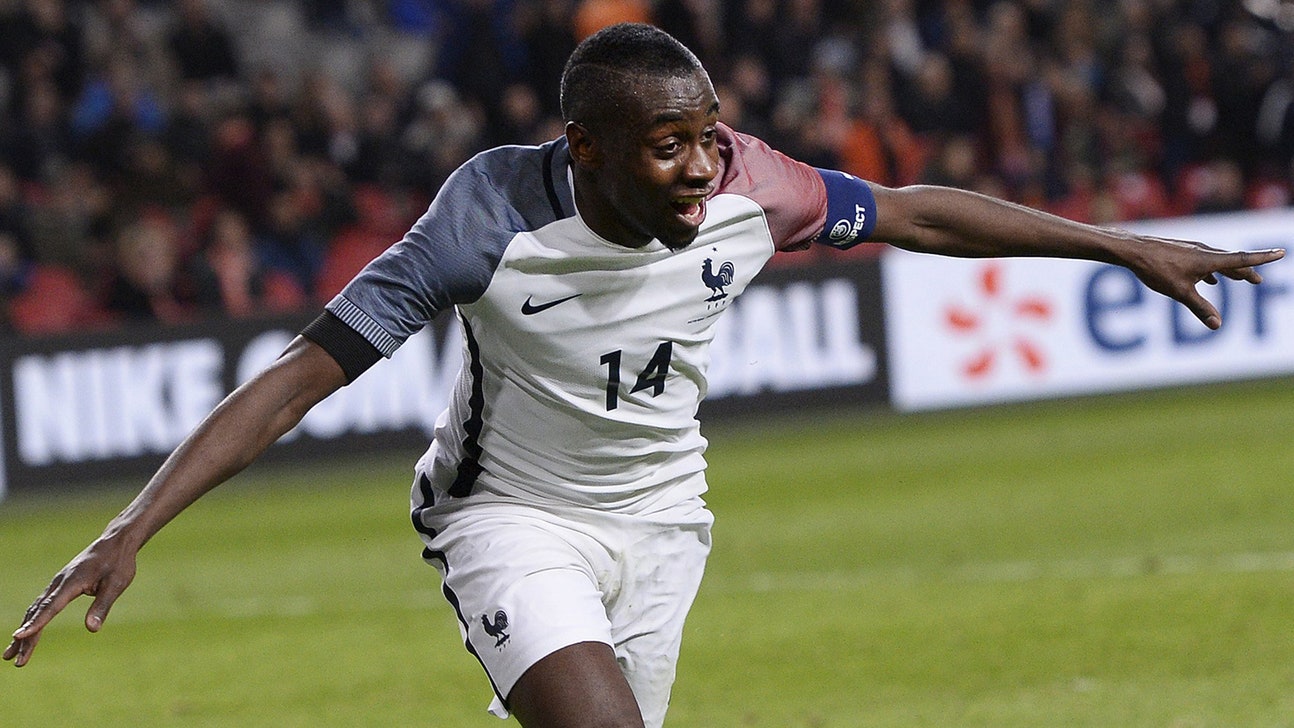 France top Netherlands late in emotion-charged friendly