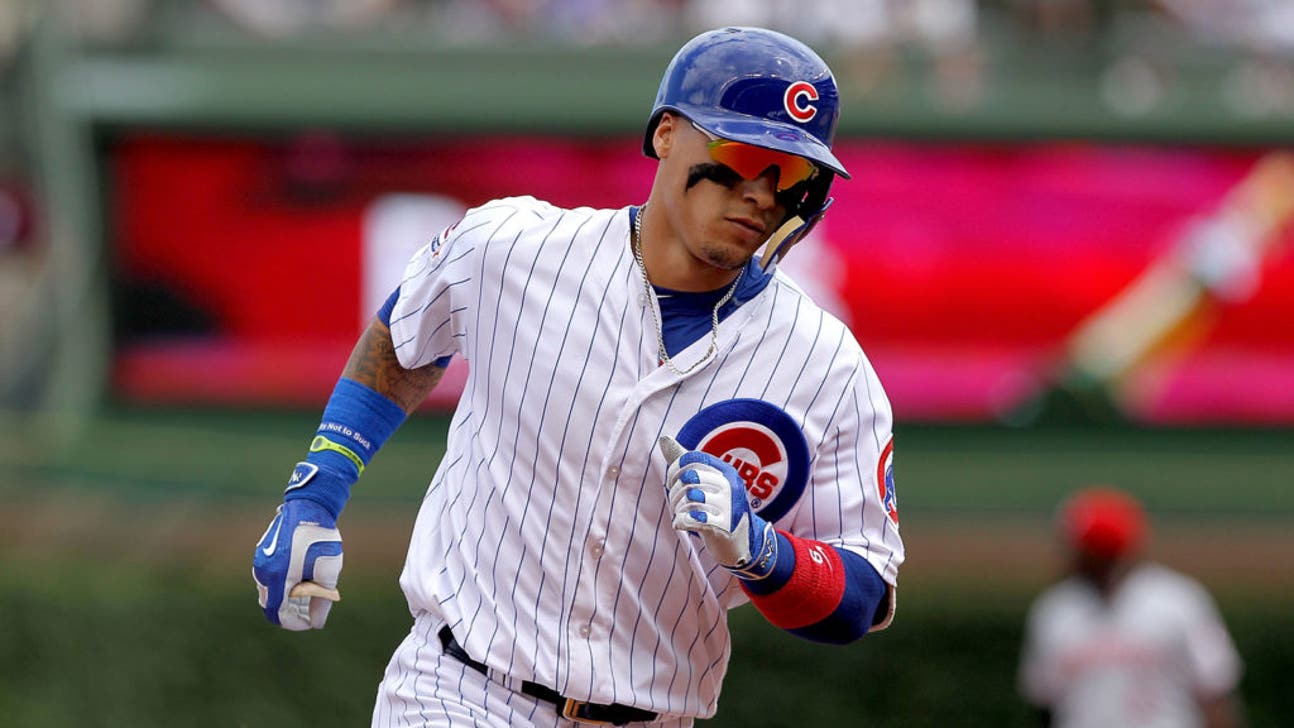 Umpire shoves Cubs' Javier Baez after he crosses home plate