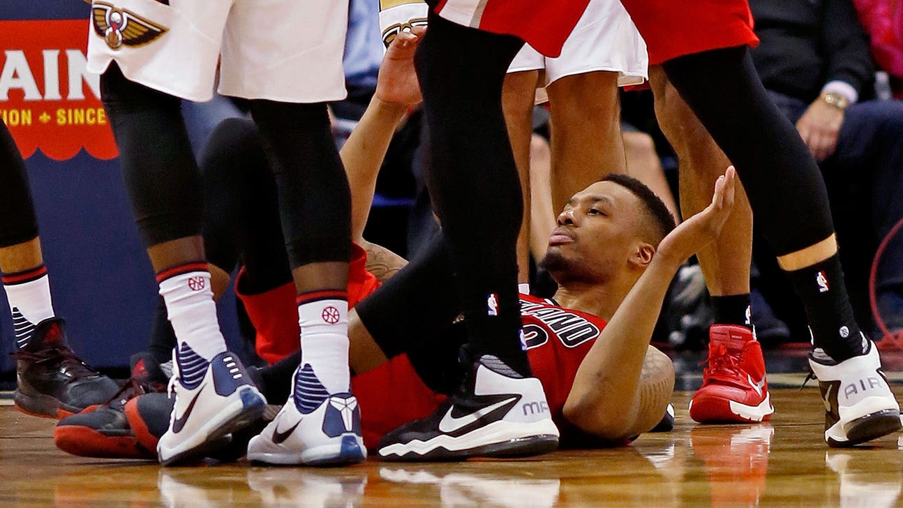 Dame Lillard clotheslined by Kendrick Perkins, shakes it off: 'I'm from Oakland'