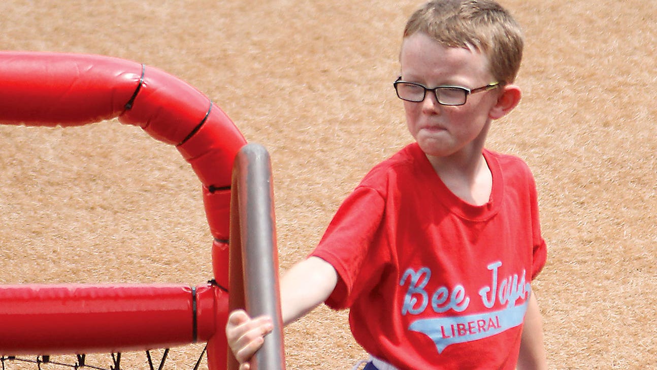 Kansas team plays on in memory of fallen batboy Kaiser Carlile