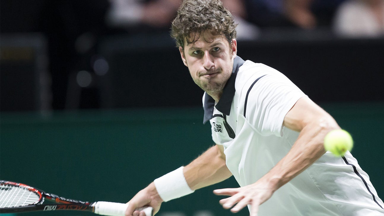 The coach of a top-ranked tennis player was arrested on suspicion of murder