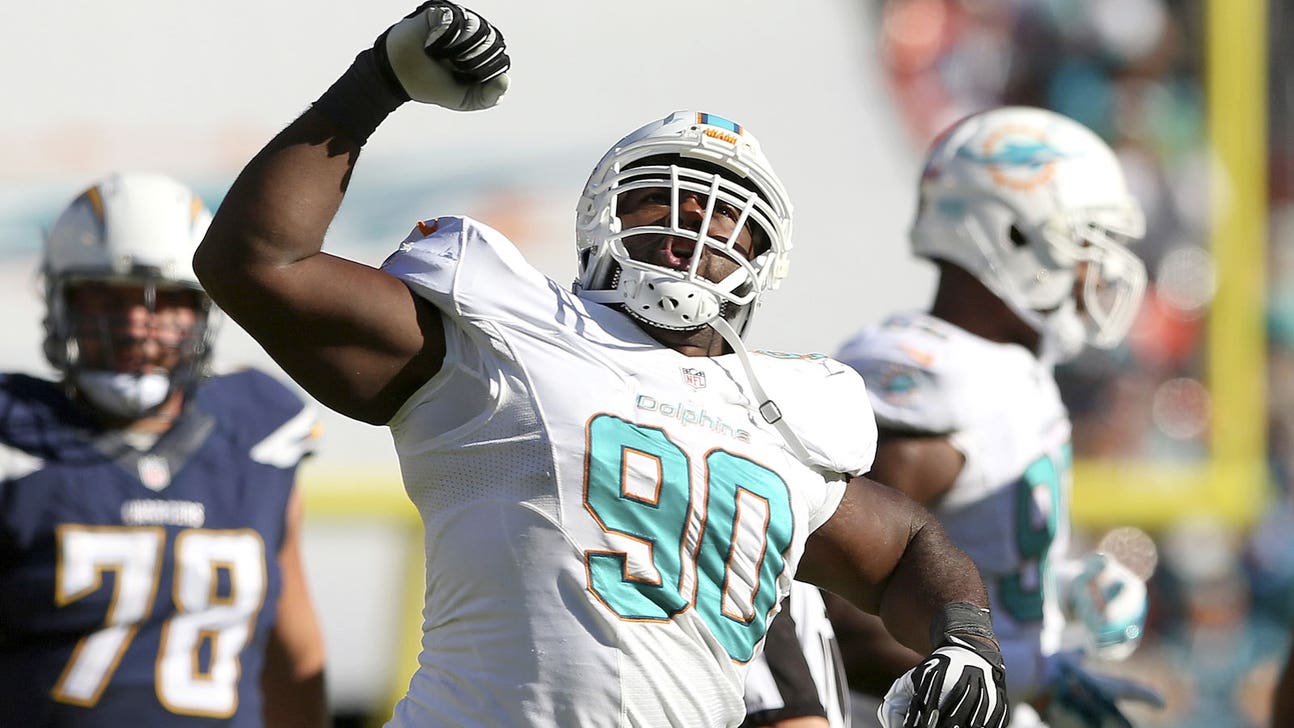 Dolphins DT Mitchell is catching passes as a fullback in practice