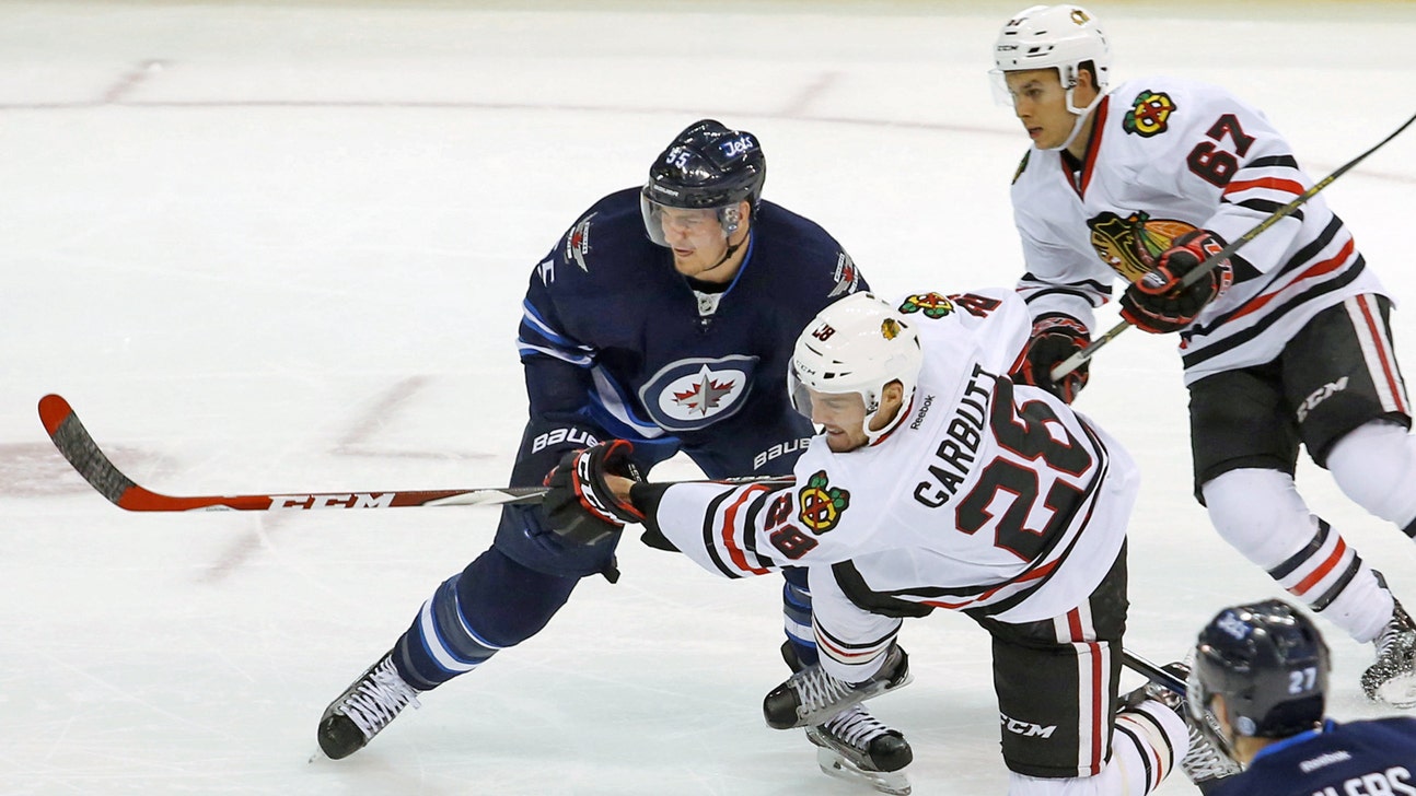 Jets put champ's winning streak on ice in Winnipeg