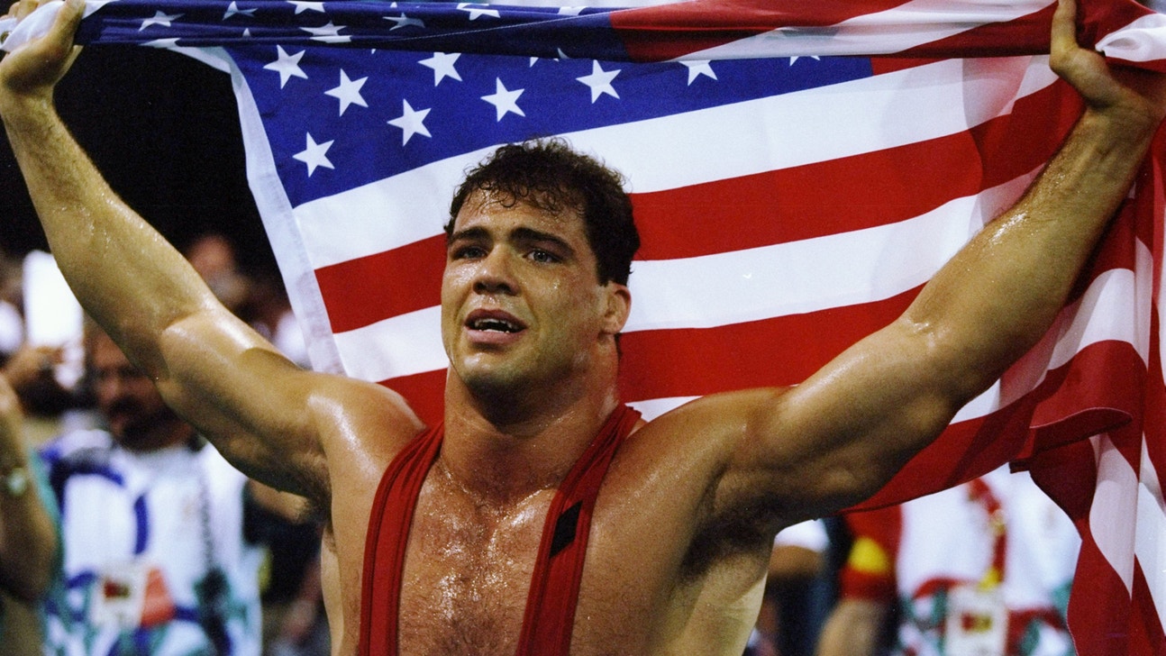 Kurt Angle offers Chris Weidman help with his neck injury
