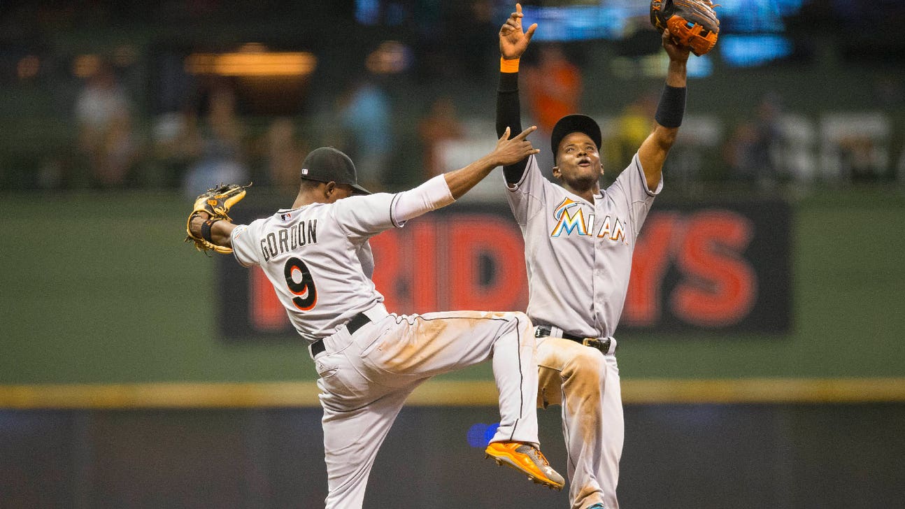 Suzuki, Marlins hold off Brewers, 9-6