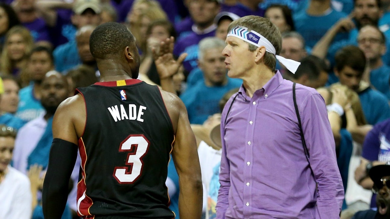 Purple shirt heckler explains exchange with Dwyane Wade