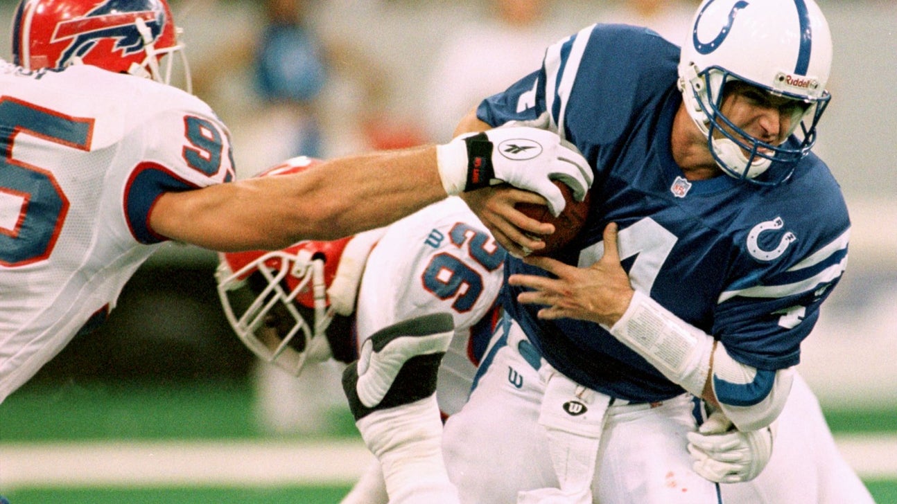 That time Jim Harbaugh broke his hand punching Jim Kelly