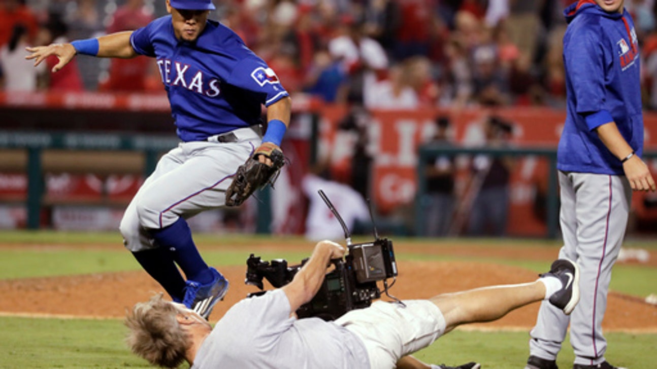 Lucroy helps Rangers beat Angels 8-5