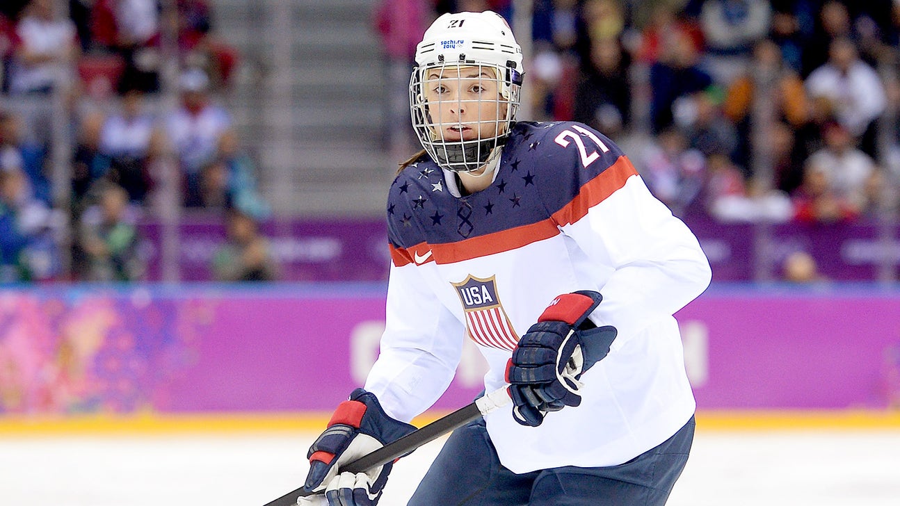 Team USA's Hilary Knight poses for photos in nothing but skates
