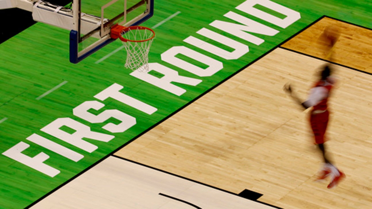 The Latest: Decosey's 3 free throws send Temple-Iowa to OT