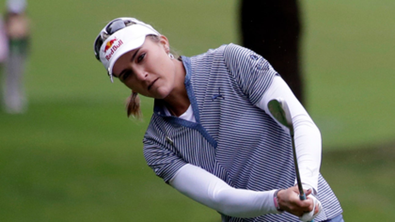 Lexi Thompson fights back pain, takes Meijer LPGA lead