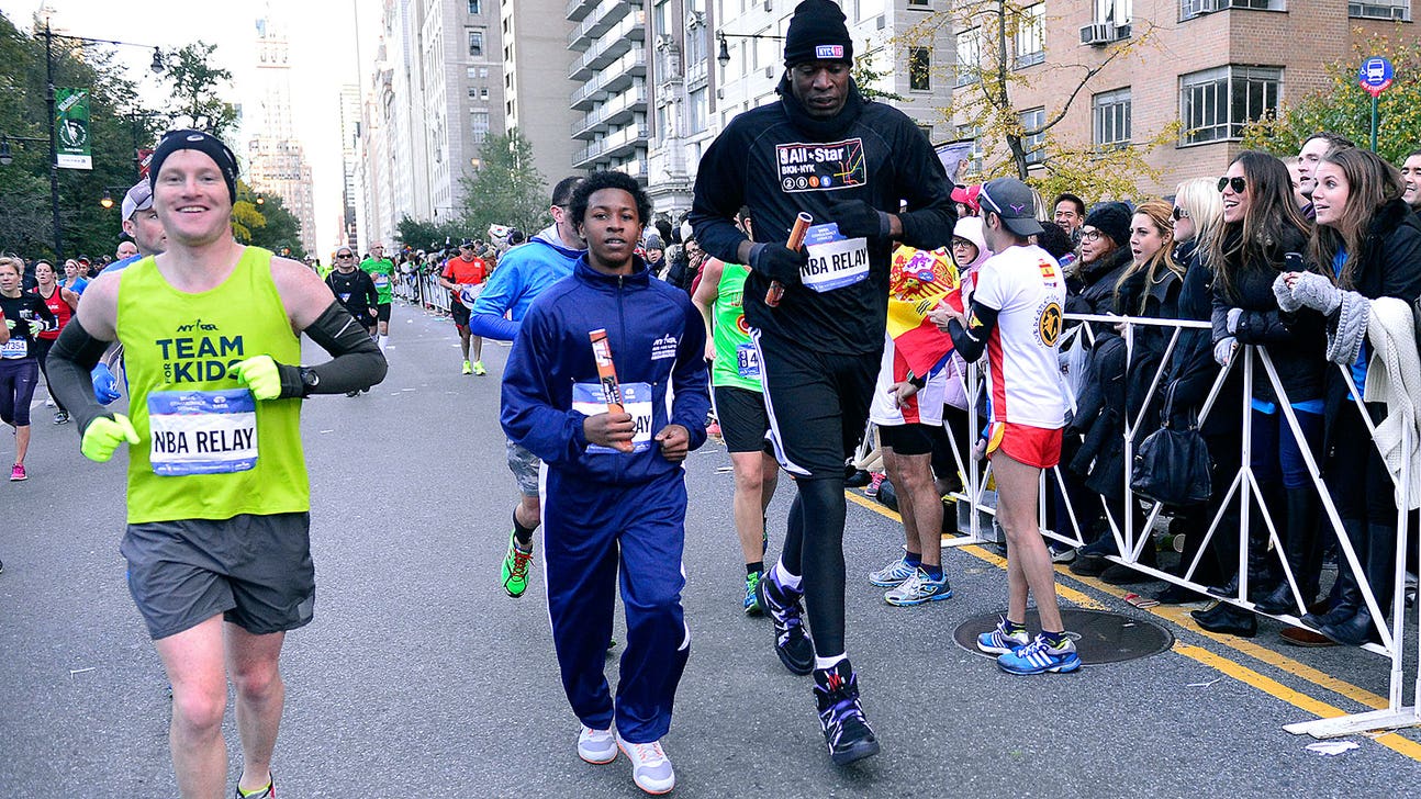 Dikembe Mutombo crosses marathon finish line for NBA relay
