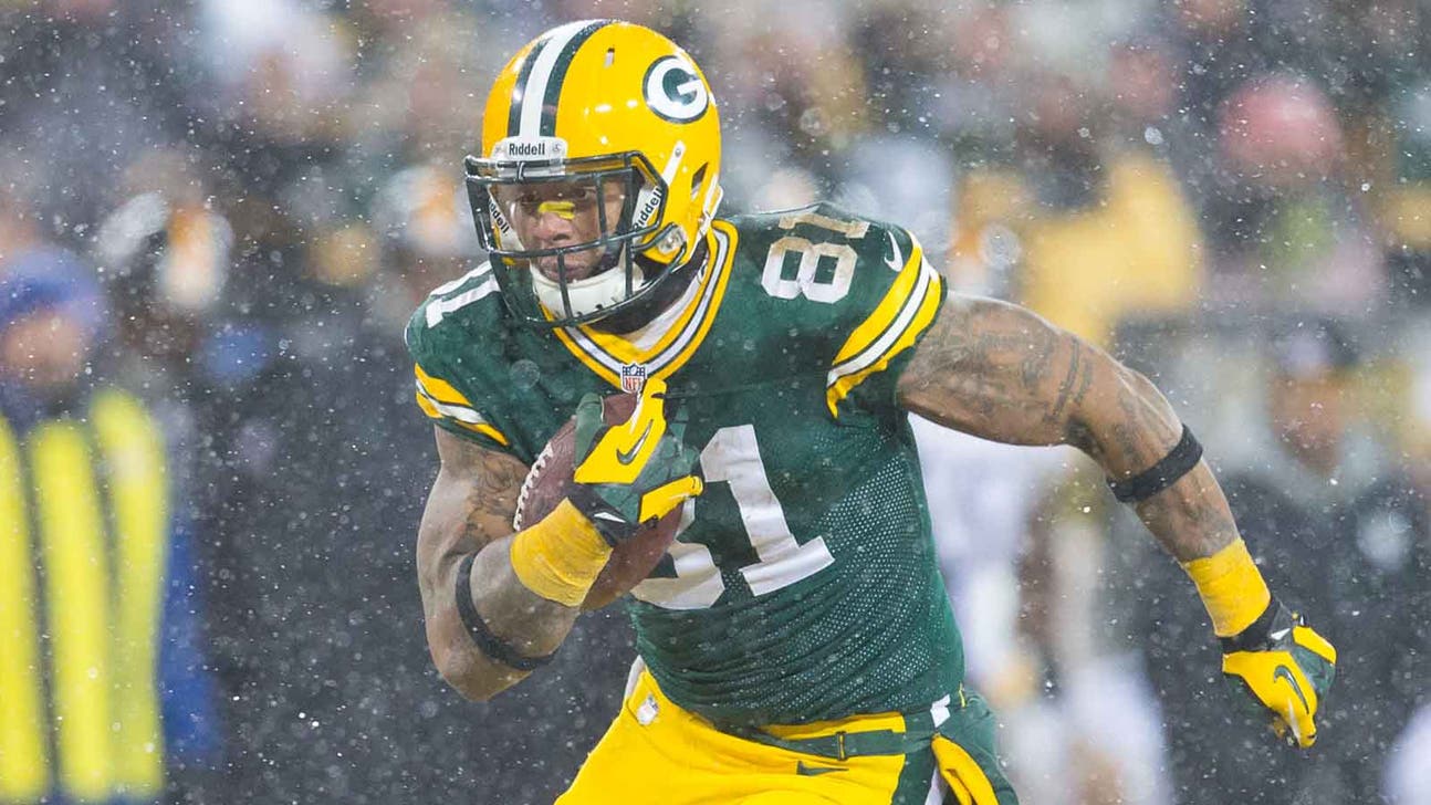 Free-agent TE Quarless re-ups with Packers