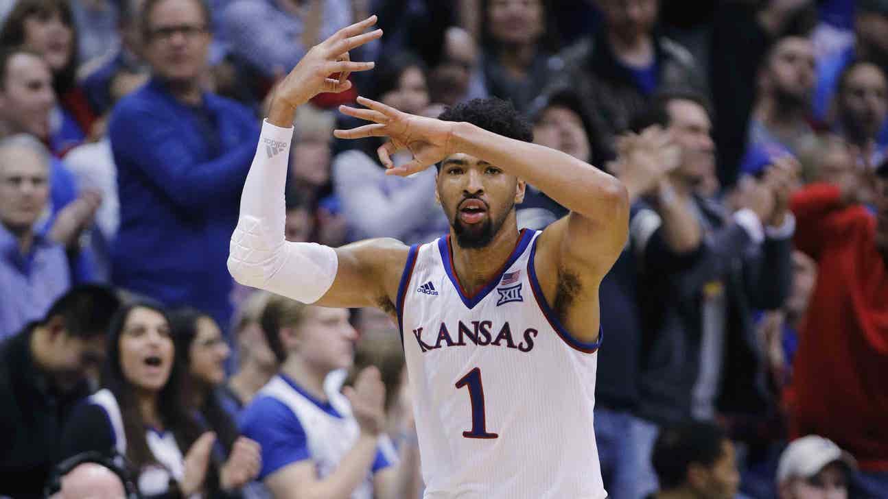 Lawson does it all to lift No. 7 Kansas past No. 25 TCU 77-68