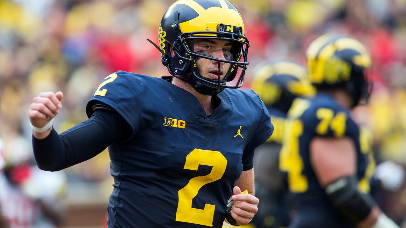 Patterson learning on the run at Michigan