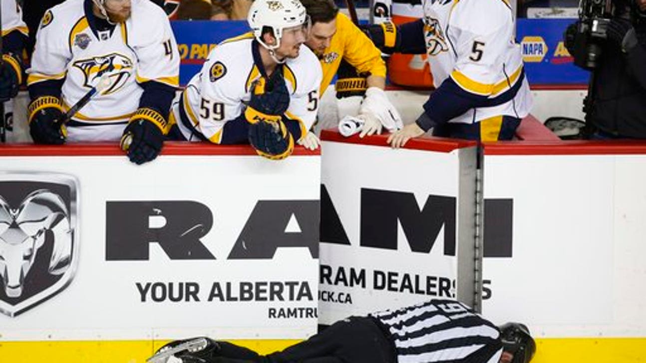 Linesman hit by Wideman is out for season with concussion
