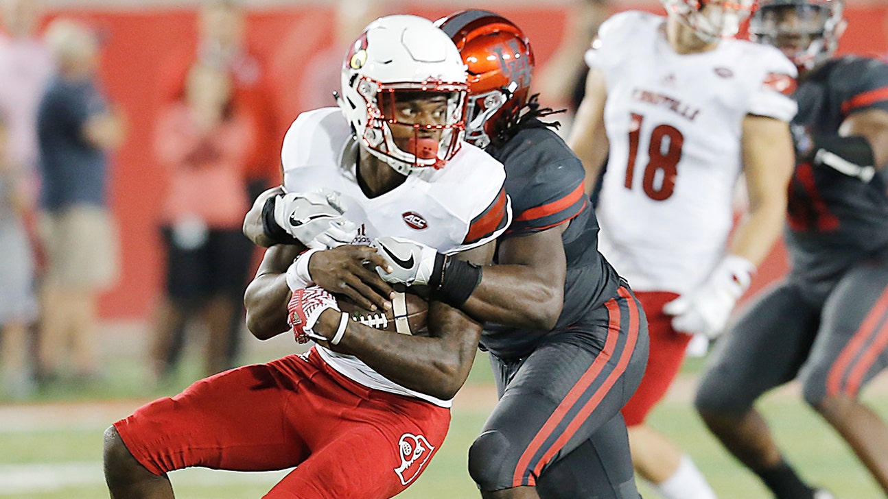 Houston overpowers Louisville, Lamar Jackson to end their playoff hopes