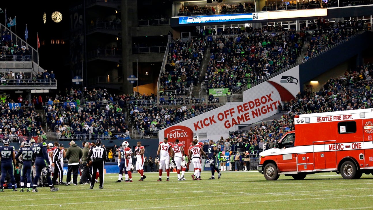 Cardinals' Iupati taken off on stretcher after collision