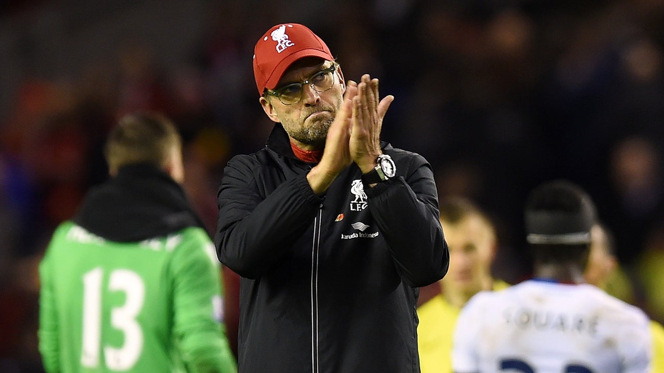 Reds boss Klopp admits he 'felt alone' as fans left Anfield early