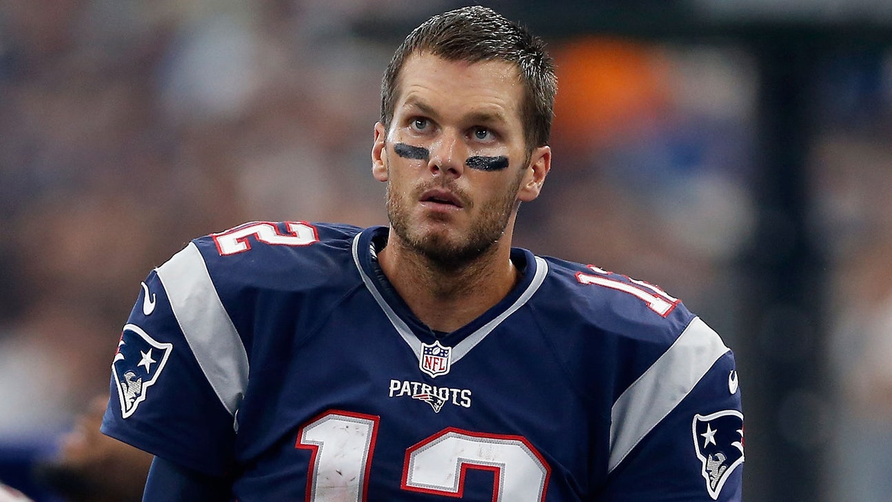 PHOTO: Tom Brady impostor runs marathon while juggling deflated footballs