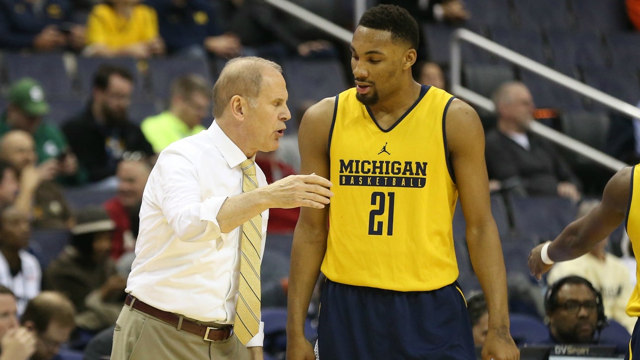 Michigan forced to improvise after game jerseys delayed by airplane incident