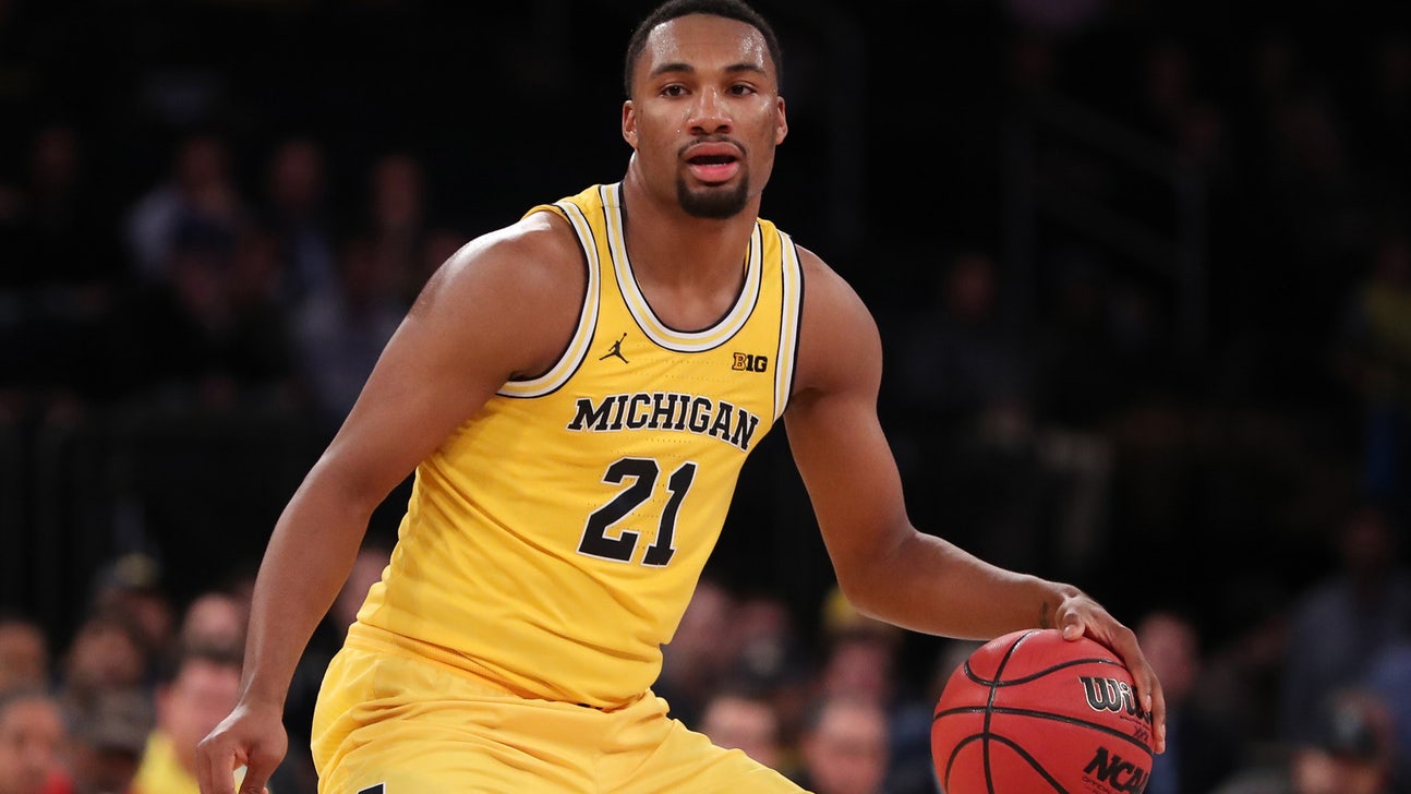 Irvin leads Michigan to rout of Marquette
