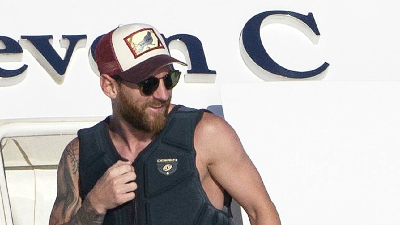 Obsessed Messi fan swims out to yacht to greet Barcelona star
